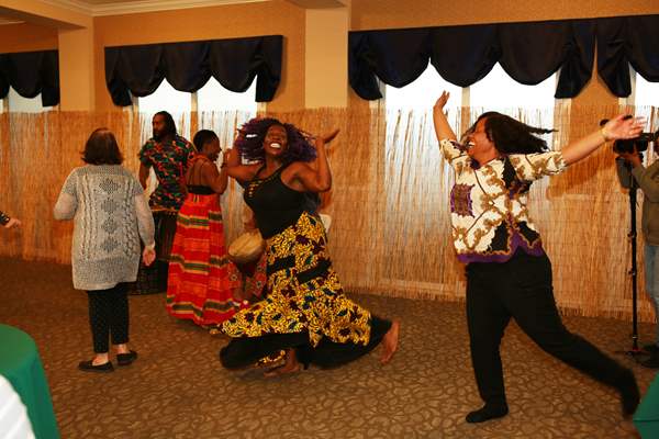 Community celebrating African dance