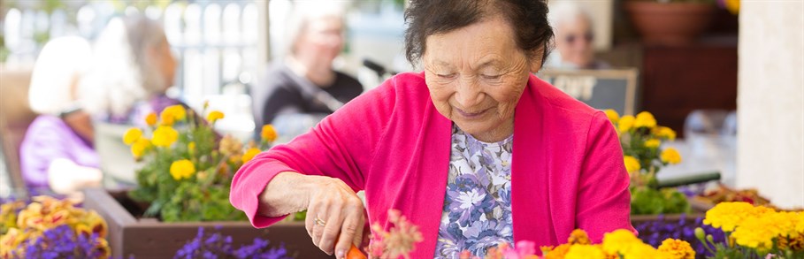 Silverado resident gardening flowers