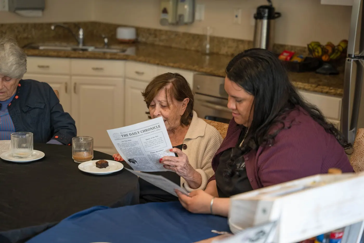 Reading the news together over dessert