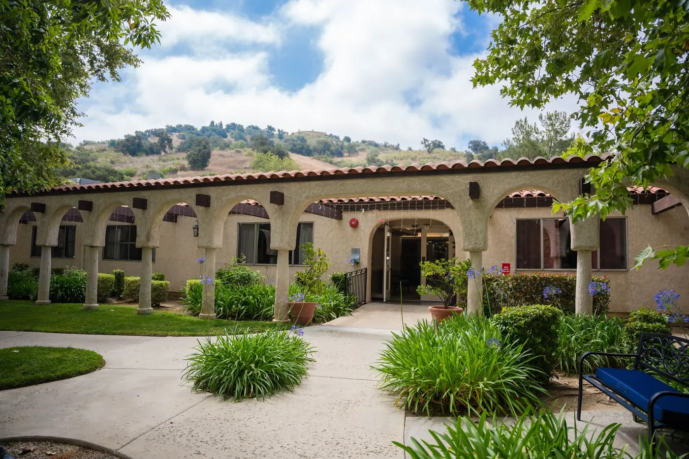 The building exterior and courtyard plantings