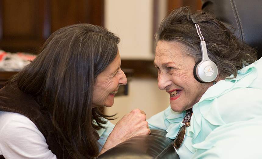 Resident using eversound headphone system