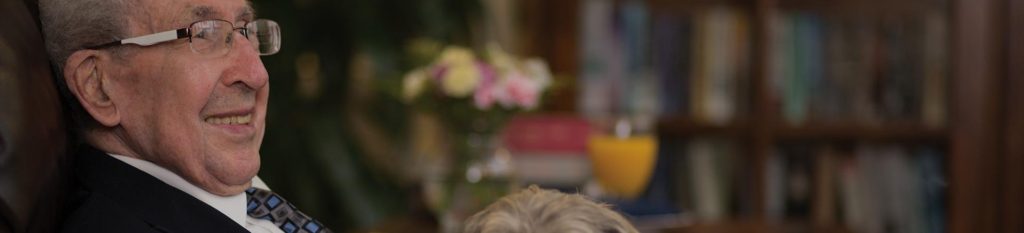 Resident smiling in living room